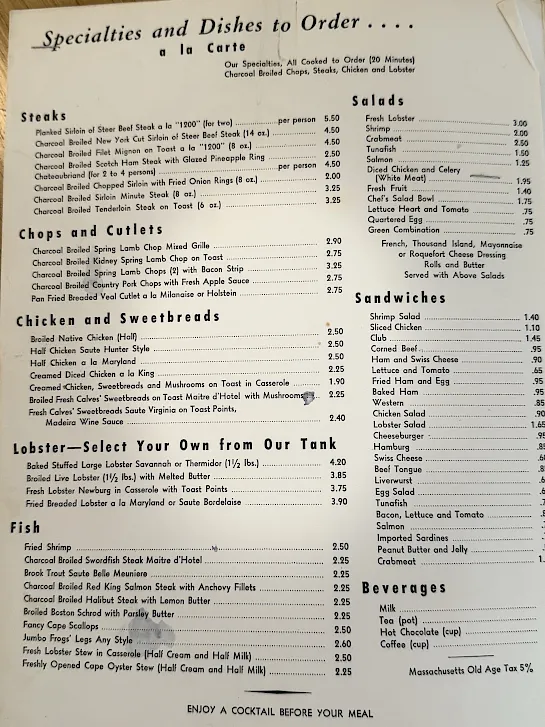 A restaurant menu page listing seafood, steaks, chops, chicken, salads, sandwiches, fish, and beverages with prices and “cook to order.”.