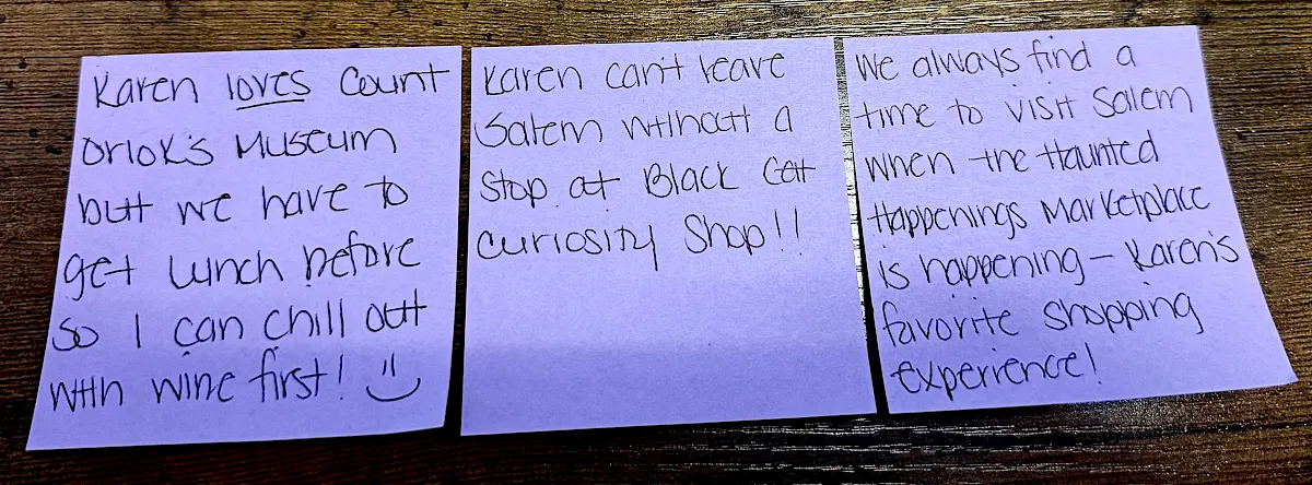 Three purple sticky notes on a wooden table read: “Karaen loves…”, “Karen can’t leave…”, and “We always find a…”.